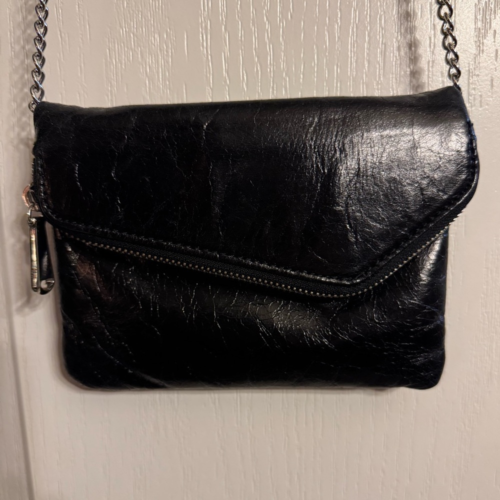 HOBO Clutch/ Crossbody with Blue and Rust color Floral Fabric lining.